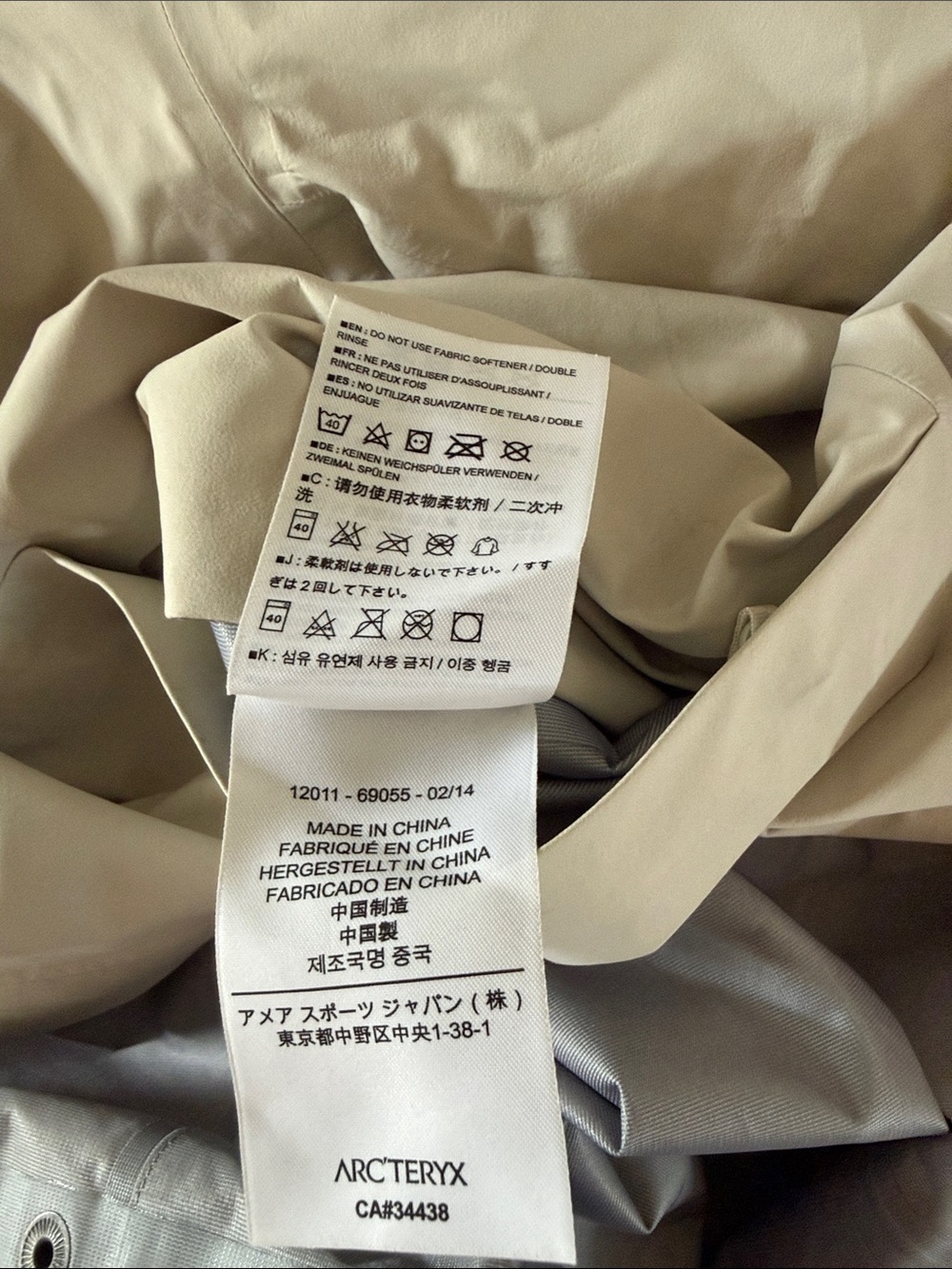 Arc'teryx Women's Hooded Raincoat in Light Beige - Picture 10 of 11